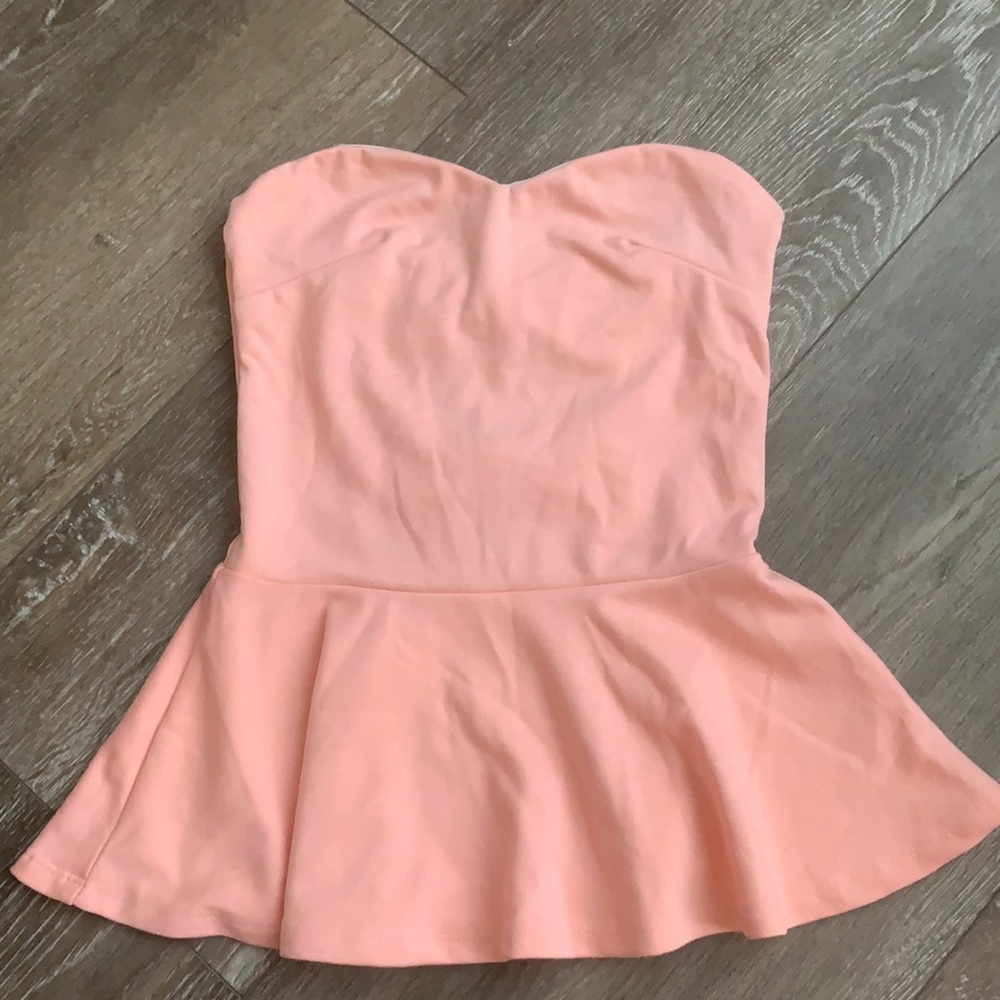 Peach Strapless Peplum top with open back & bows